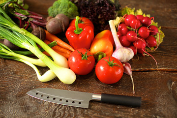 Fresh vegetables on a wooden table. Healthy food. Diet