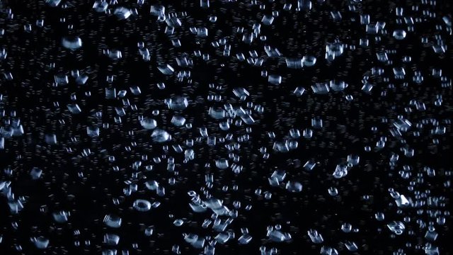 The ice falls into the water, Background,  Water bubbles in slow motion 