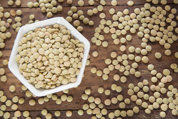 Raw lentils in the bowl - Lens culinaris