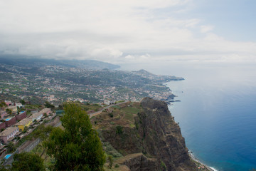 Fototapeta na wymiar Cliffs located in Cabo Girão de madeira, in the background camara de lobos village 3