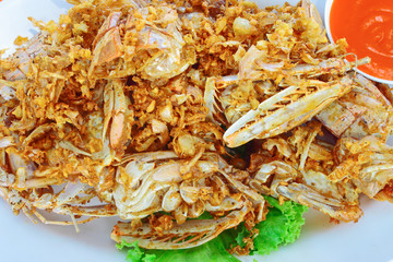 Crisp fried mantis-prawn and garlic serve with chili sauce