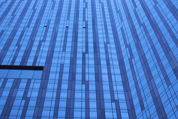 Looking up the side of a city skyscraper