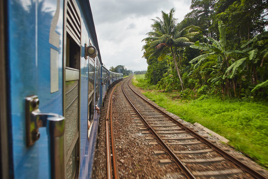 Shoot with view duringg by trail cars Sri-Lanka rail road in mountain area