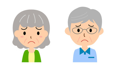 困り顔のシニア　男女