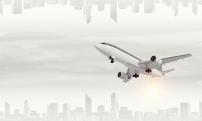 Fototapeta na wymiar Airliner in sky. Mixed media . Mixed media