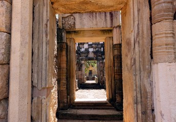 Fototapeta na wymiar Looking Through A Corridor In Thai Ruins