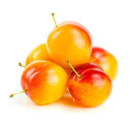 yellow plums isolated on white background