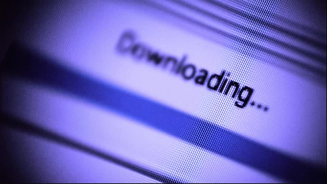 Graphic of computer downloading.