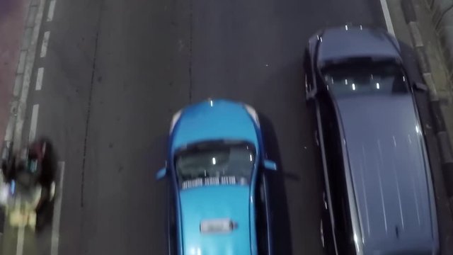 
JAKARTA, Indonesia. August 14, 2017: Top view footage of crowded highway with cars and motorcycle in Jakarta
