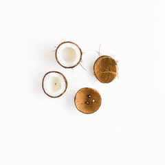 Creative layout made of coconuts and leaves. Flat lay