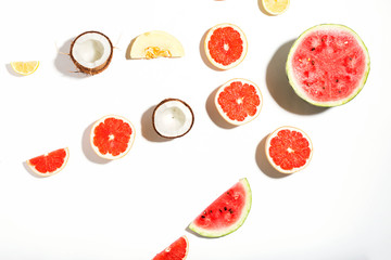 Creative layout made of watermelon, coconut, melon, grapefruit and lemon