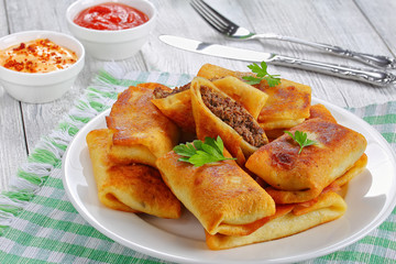 rolled up Crepes stuffed with minced liver