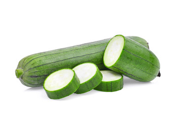 fresh green sponge gourd or luffa with slice isolated on white background