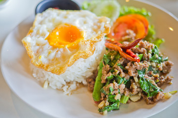  basil pork rice with fried egg . thai food 