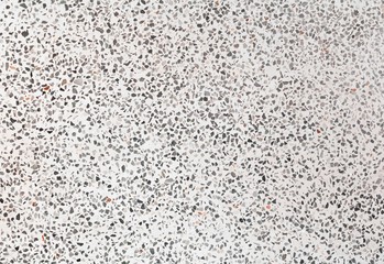 terrazzo floor old texture which has gravel stone black and gray white cement for background with copy space add text