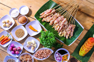 Preparing grilled chicken meat, Indonesian satay and its raw ingredient 