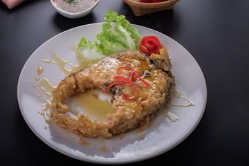 Thai food fried fish with spicy sauce