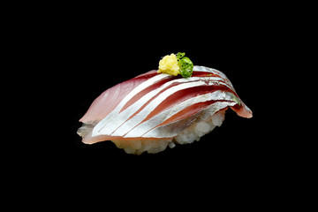 Aji Sushi or raw  horse mackerel fish on Japanese rice.Japanese tradition food with black isolated...
