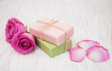 Obraz na płótnie Canvas Handmade soap and pink rose