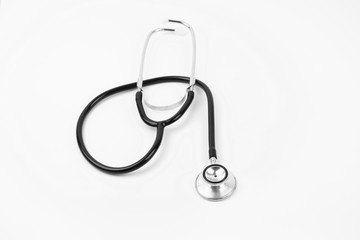 Close up view of black stethoscope on white isolate background