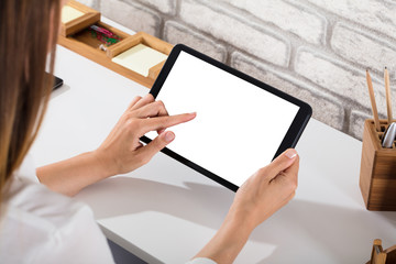 Close-up Of A Person Using Digital Tablet