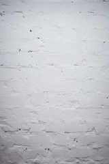 White brick wall for background or texture with vignetting