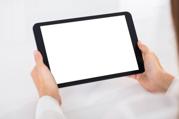 Human Hand Holding Digital Tablet