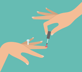 Woman hand holding nail polish and coloring nails concept