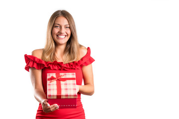 Fototapeta premium Young smiling model hold gift box.