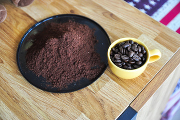 Cup full of coffee beans