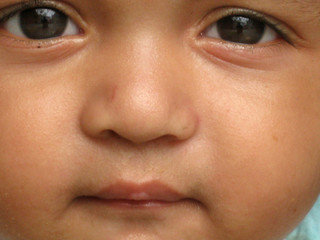 Naklejka premium baby's face close up