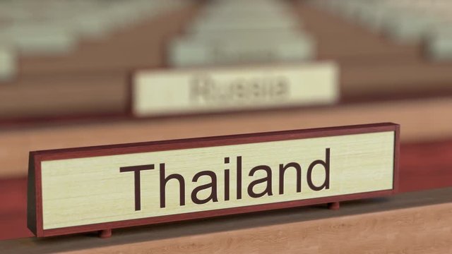 Thailand name sign among different countries plaques at international organization. 3D rendering