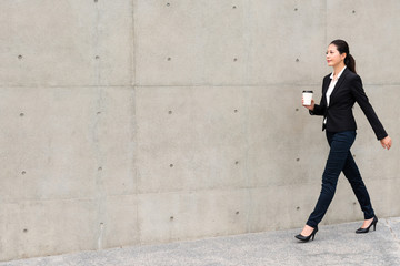 lawyer woman confident walking on outdoor