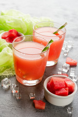 Two bottles of watermelon juice