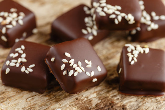 Handmade chocolate candies with sesame seeds