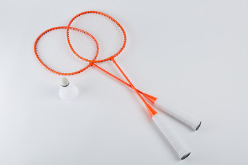 Badminton racket with a dart.