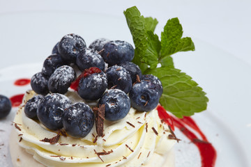 Meringue cake Pavlova with blueberry