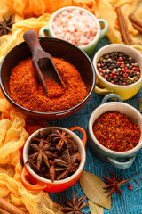 Spices and condiments in small bowls