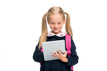 schoolgirl using digital tablet