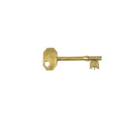old fashioned brass key on white background