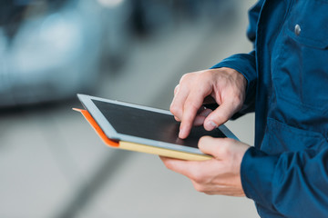 male hands using digital tablet