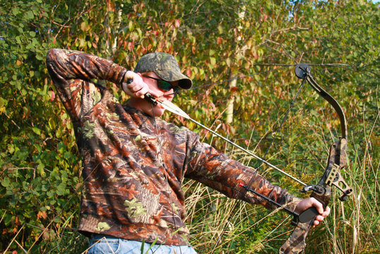 bow hunter shooting