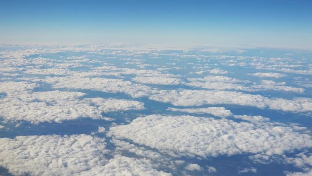 High quality aerial shot above the clouds in 4K