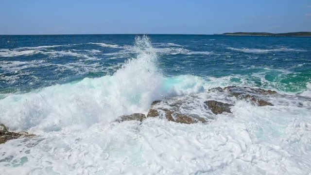 Rocky shore of the Adriatic sea after storm slow motion from 120fps