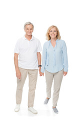 senior couple holding hands