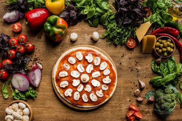 raw pizza with mushrooms