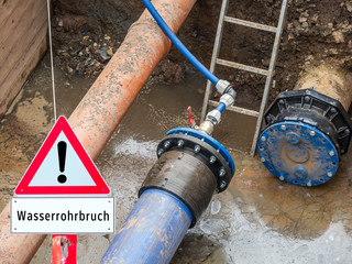 Warnschild Wasserrohrbruch