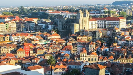 Fototapeta na wymiar Cityscape of Porto, Portugal, viewed from the Torre dos Clerigos - buildings, traditional houses and landmarks in sunset light
