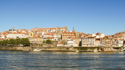Fototapeta na wymiar Porto, Portugal - Circa October 2013: Cityscape of Porto and the Douro river