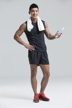 Male athlete with a bottle of water